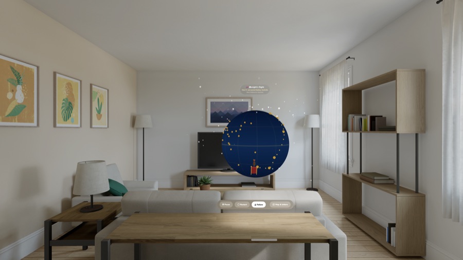 A living room seen through Apple Vision Pro with Santa's globe floating in the middle of the room, gold pins marking the route